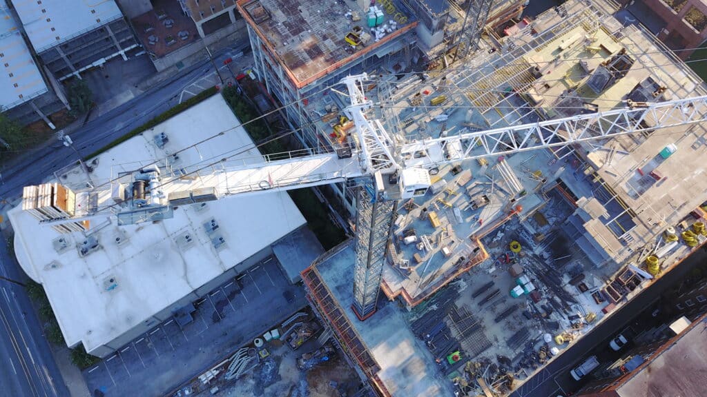 Top view of a Tower crane working on a project