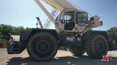 Maxim Crane Rough Terrain Crane Overview video thumbnail - image is of a rough terrain crane on a lot
