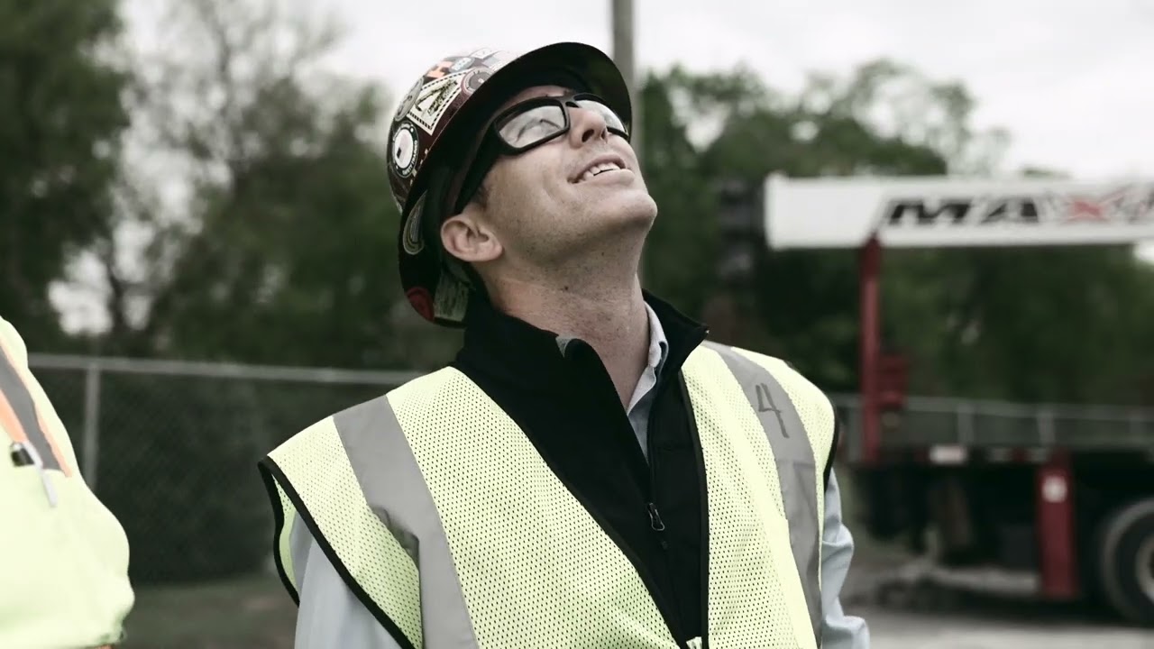 Dustin Gramenz, a National Sales Executive with Maxim Crane on the job site